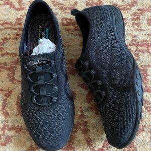 Skechers black slip on sneaker